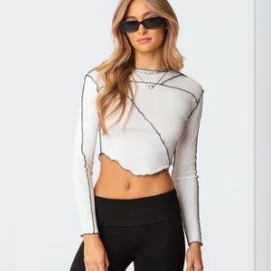 373. NWT Tia Asymmetrical Stitch Top